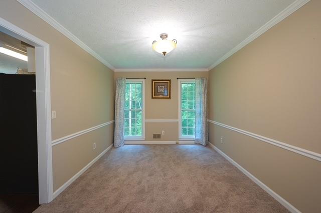 26 Flint Ridge Drive Southeast Mableton, GA 30126 - Photo 15 of 28 a view of a livingroom with a ceiling fan and window