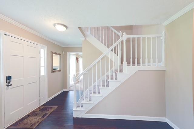 26 Flint Ridge Drive Southeast Mableton, GA 30126 - Photo 2 of 28 a view of entryway and hall with wooden floor
