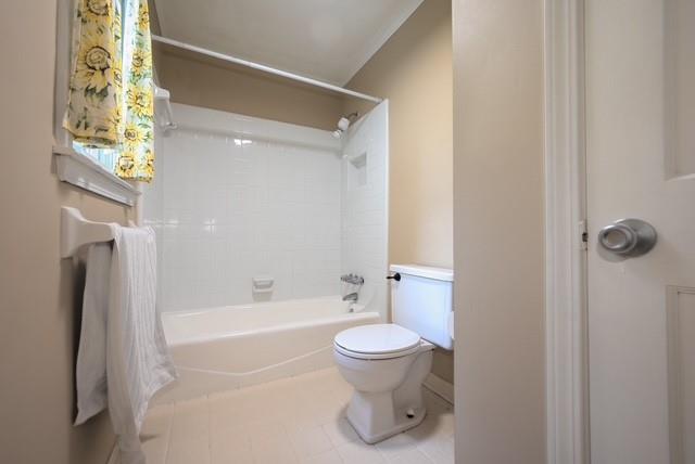 26 Flint Ridge Drive Southeast Mableton, GA 30126 - Photo 21 of 28 a bathroom with a toilet and a bathtub