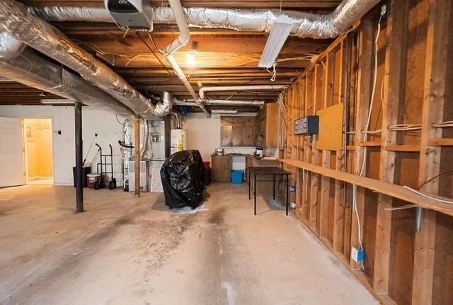 a view of a hallway with storage and utility