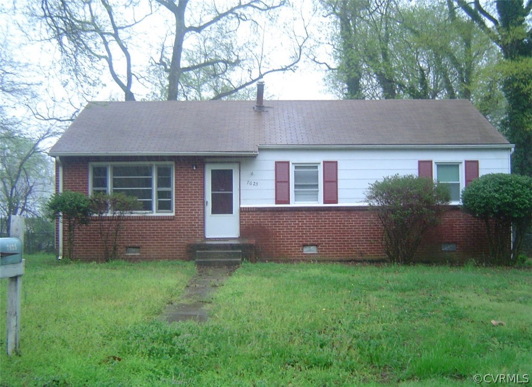 7625 Ponce De Leon Road North Chesterfield, VA 23237 - Photo 1 of 7 a front view of house with yard and green space