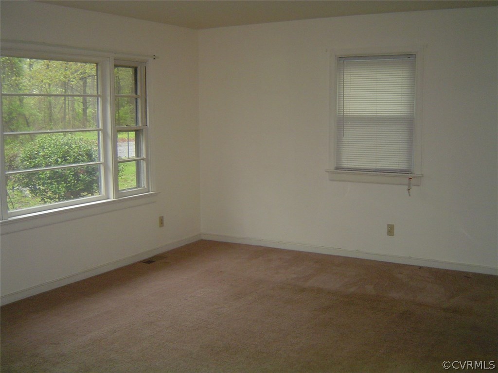7625 Ponce De Leon Road North Chesterfield, VA 23237 - Photo 2 of 7 an empty room with a window