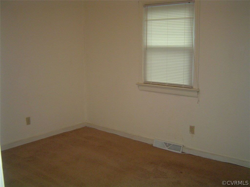 7625 Ponce De Leon Road North Chesterfield, VA 23237 - Photo 4 of 7 an empty room with a window