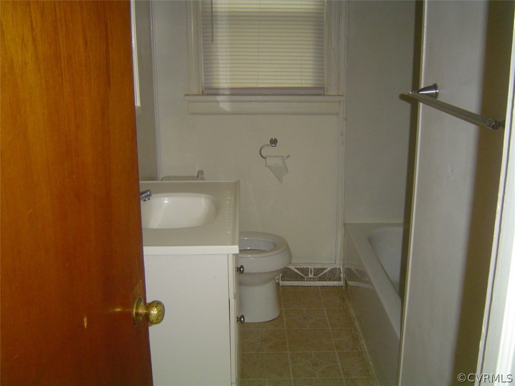 7625 Ponce De Leon Road North Chesterfield, VA 23237 - Photo 5 of 7 a bathroom with a toilet and a shower