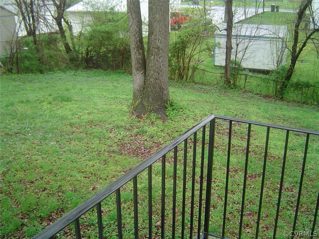 7625 Ponce De Leon Road North Chesterfield, VA 23237 - Photo 7 of 7 a view of a balcony with a yard