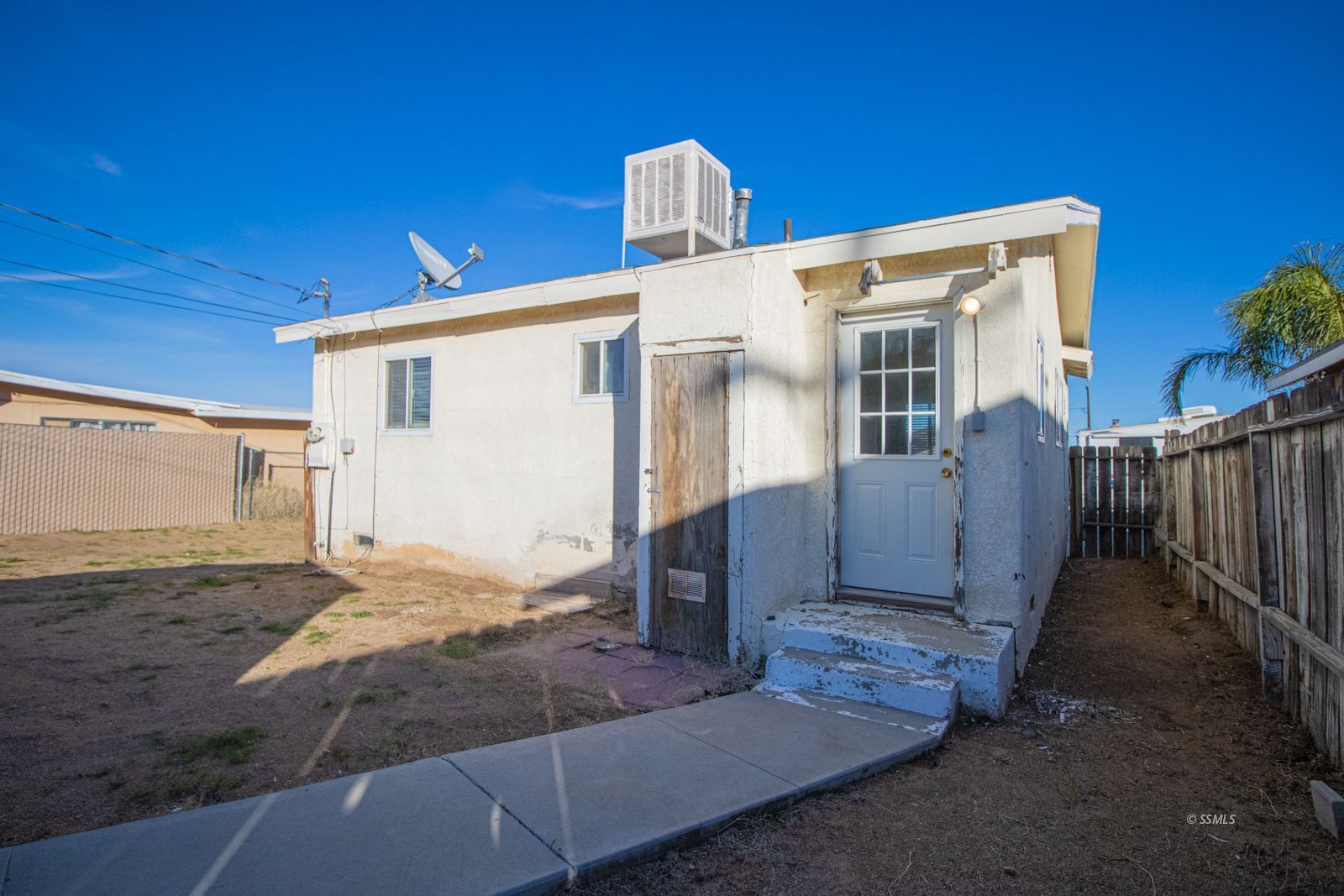 1621 Sims Street Ridgecrest, CA 93555 - Photo 21 of 24 a view of a house with backyard