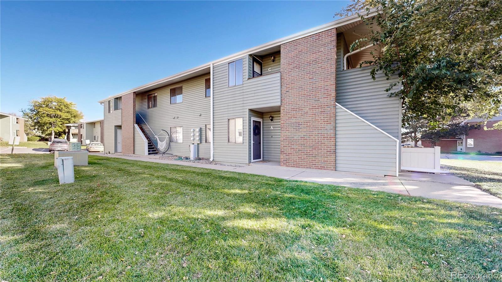 1800 Ionic Drive, Unit C Lafayette, CO 80026 - Photo 1 of 19 a house view with a backyard space