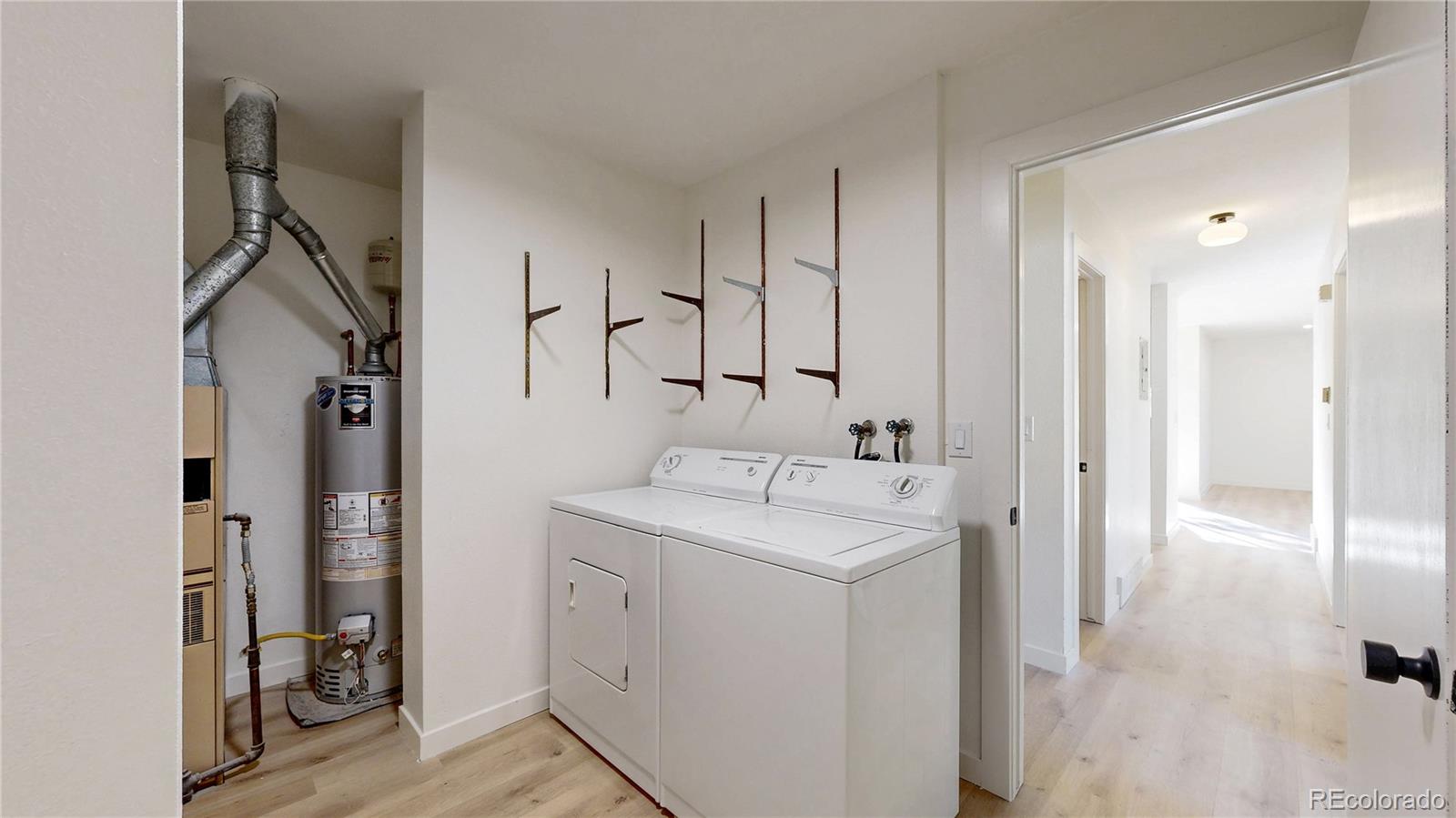1800 Ionic Drive, Unit C Lafayette, CO 80026 - Photo 13 of 19 a bathroom with a sink and a mirror