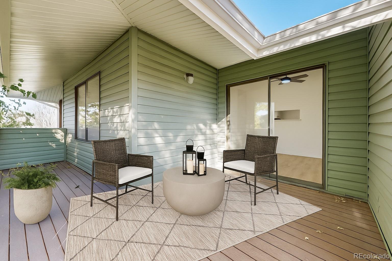 1800 Ionic Drive, Unit C Lafayette, CO 80026 - Photo 15 of 19 a view of a patio with table and chairs and potted plants