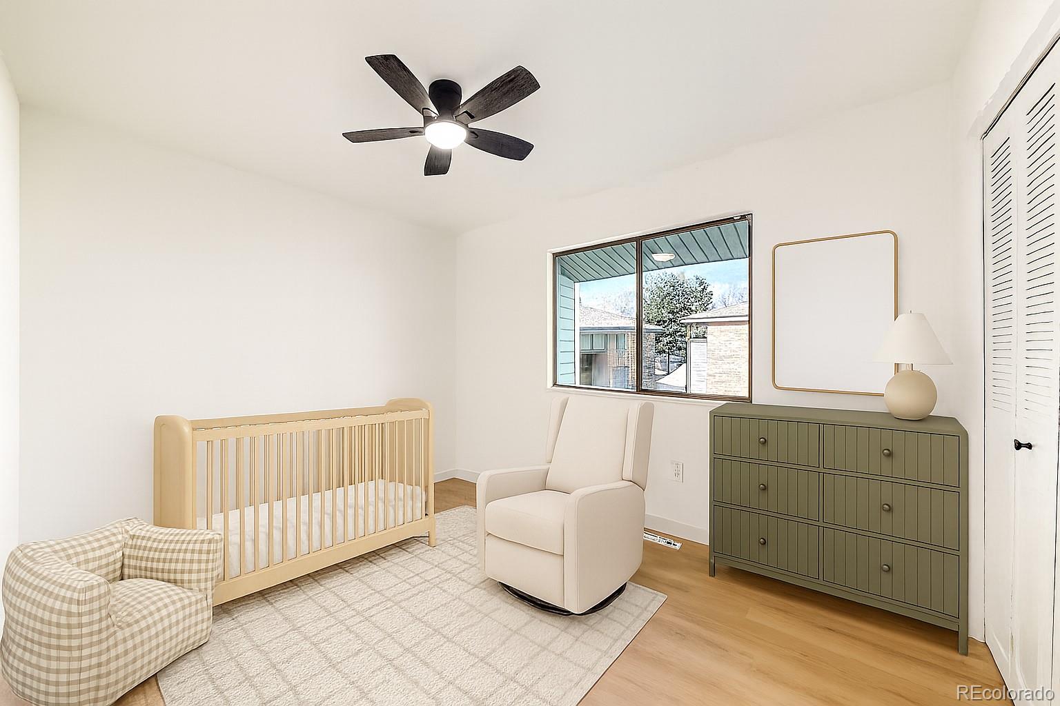 1800 Ionic Drive, Unit C Lafayette, CO 80026 - Photo 10 of 19 a bedroom with a bed and a window