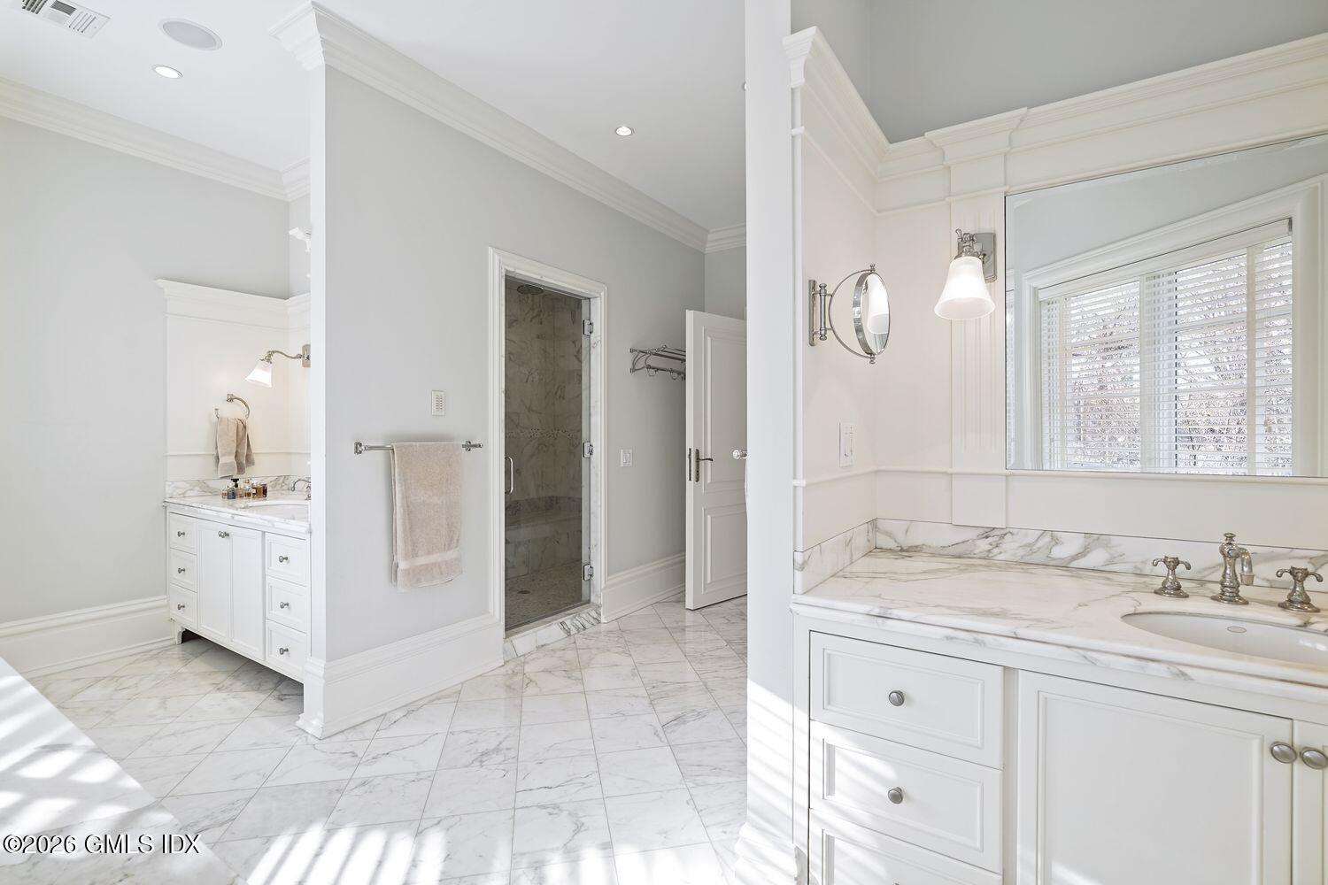 44 Hunting Ridge Road Greenwich, CT 06831 - Photo 16 of 30 a spacious bathroom with a granite countertop sink mirror and