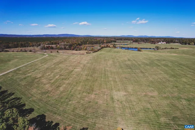 a view of a swimming pool and an outdoor space