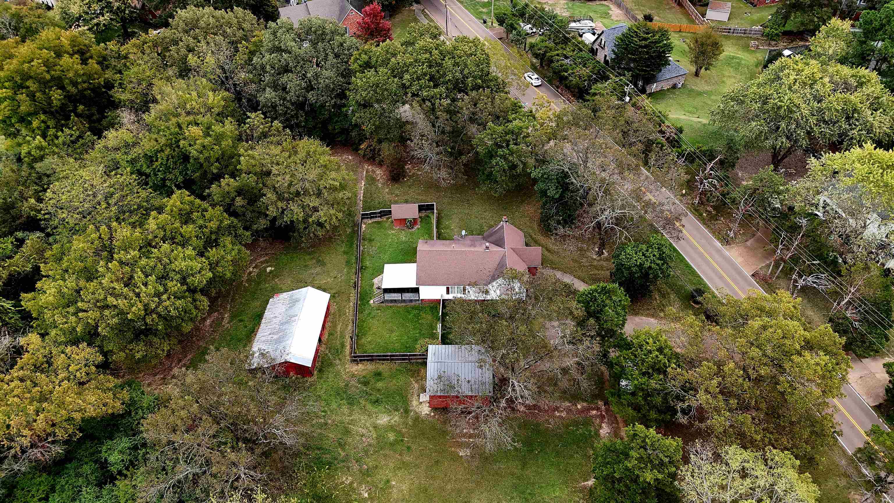 450 Fletcher Road Collierville, TN 38017 - Photo 3 of 5 an aerial view of a house with a yard and lake view
