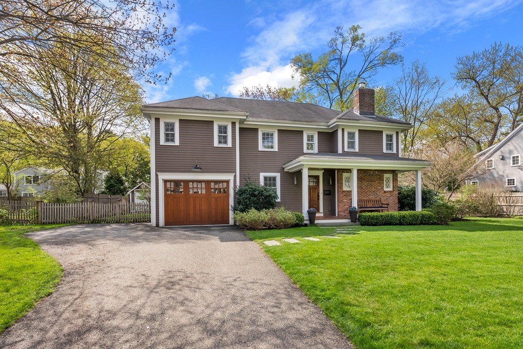 27 Boulder Brook Road Wellesley, MA 02481 - Photo 3 of 41 a front view of a house with a yard and trees