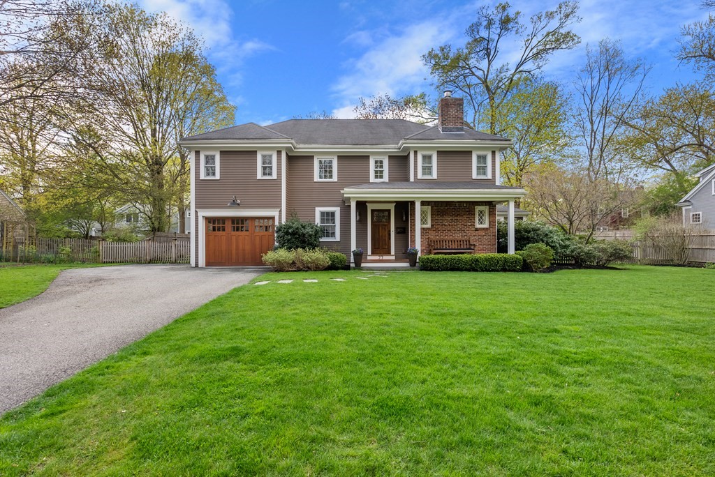 27 Boulder Brook Road Wellesley, MA 02481 - Photo 34 of 41 a front view of a house with a yard and trees