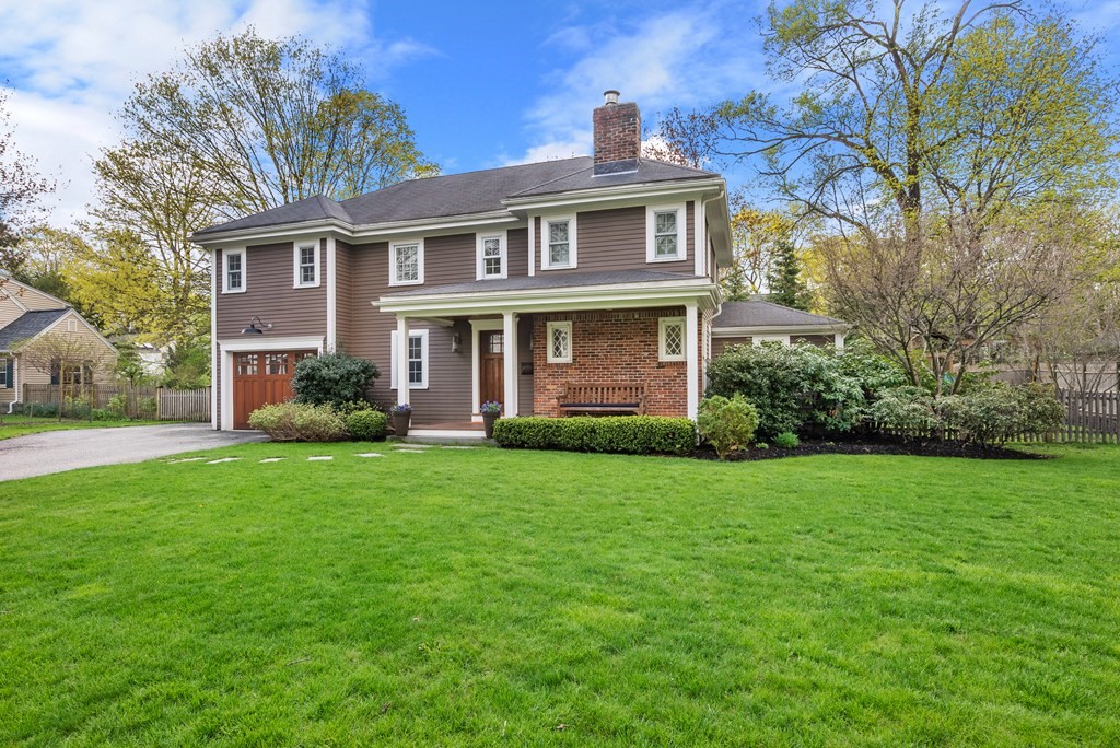 27 Boulder Brook Road Wellesley, MA 02481 - Photo 35 of 41 a front view of a house with a yard and trees