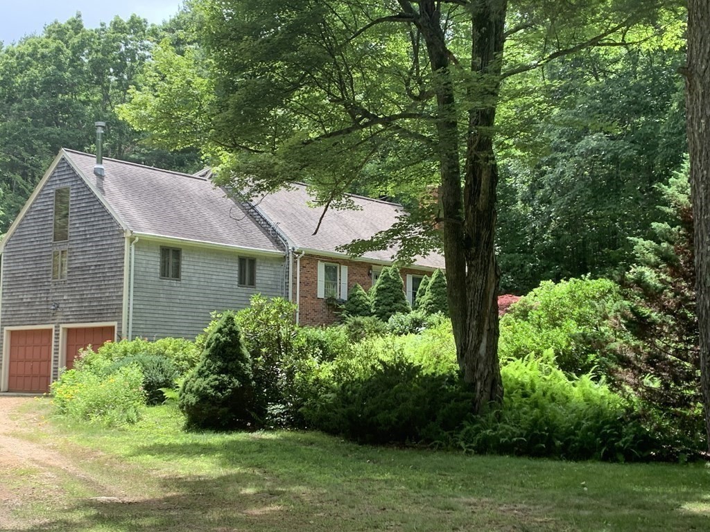 40 Prospect Street Rutland, MA 01543 - Photo 33 of 33 a view of a house with a yard and potted plants