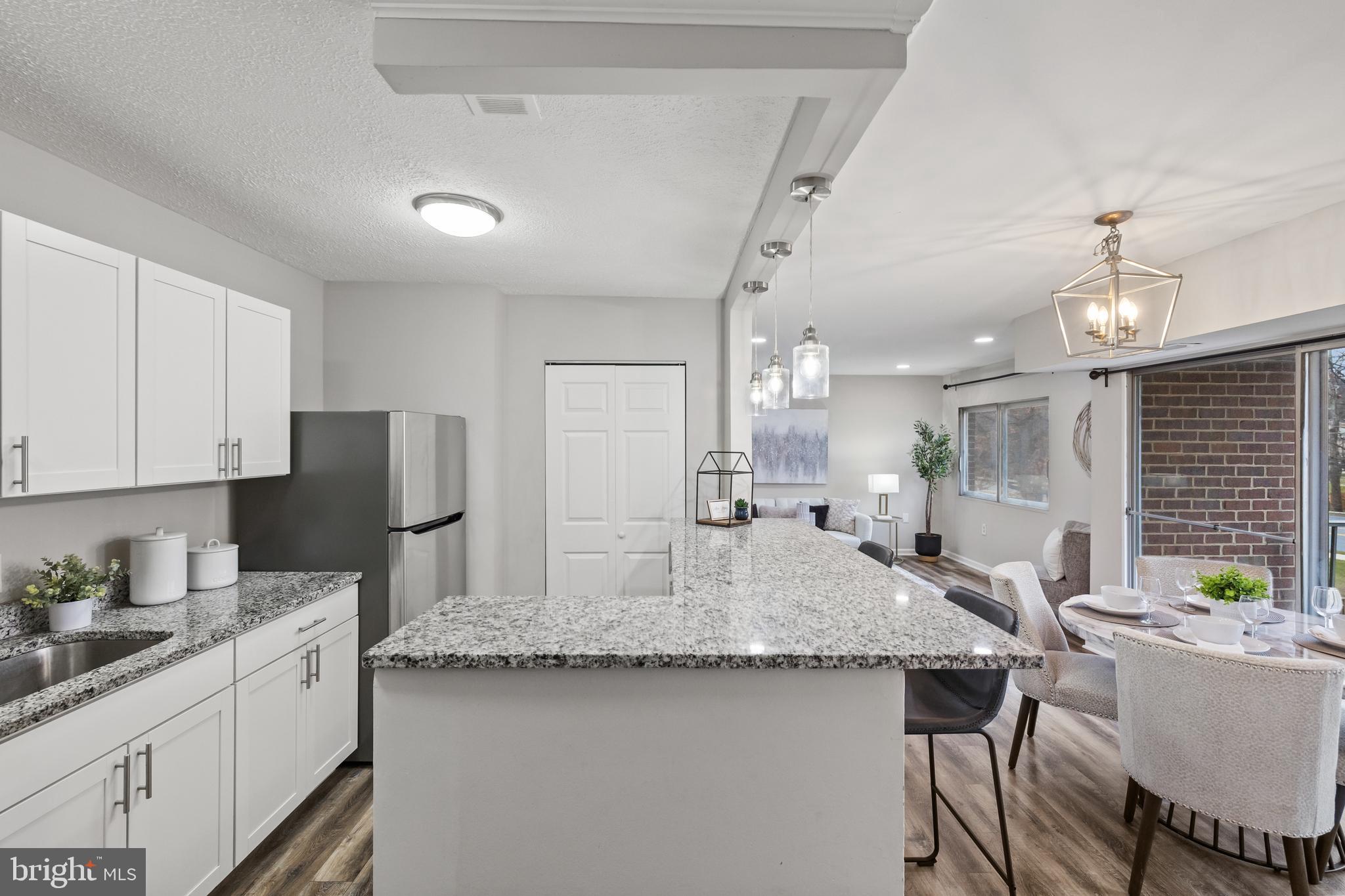 3802 Bel Pre Road, Unit 11 Silver Spring, MD 20906 - Photo 11 of 31 Updated kitchen with a huge countertop!