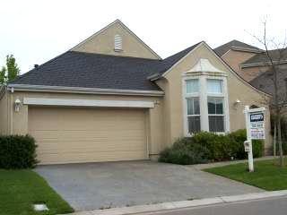 2013 Falcon Ridge Drive Petaluma, CA 94954 - Photo 1 of 1 a front view of a house with garage