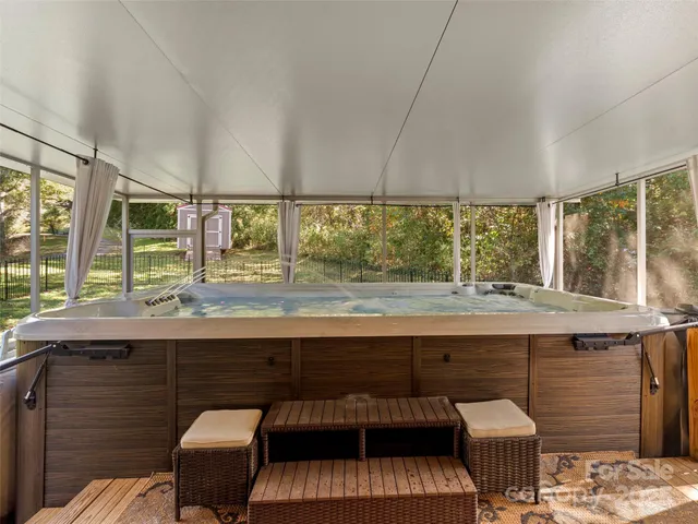 a kitchen with a sink and a large window