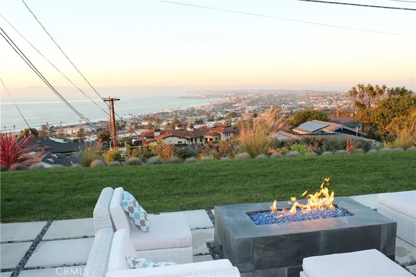 a view of a patio with a yard