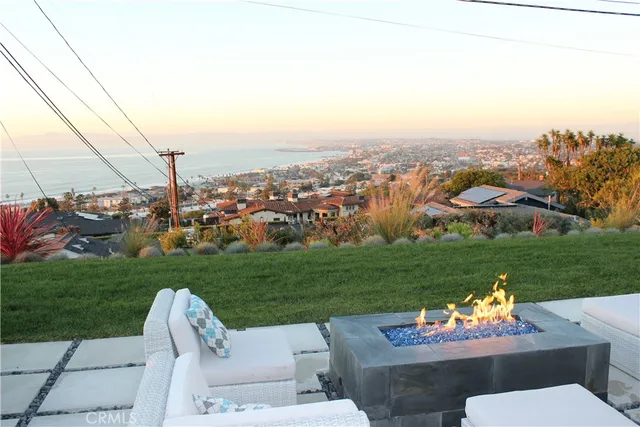 a view of a patio with a yard