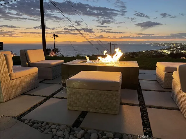 a balcony with furniture and lamp
