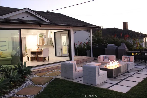 a outdoor living space with furniture and a garden