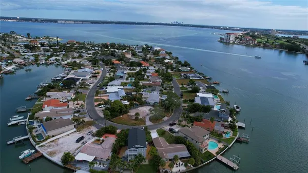 an aerial view of a house with outdoor space