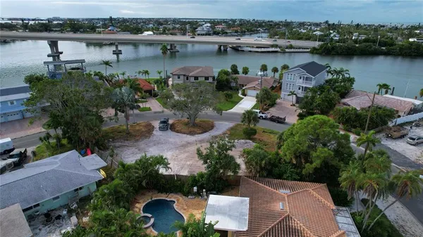 an aerial view of a city with lake view