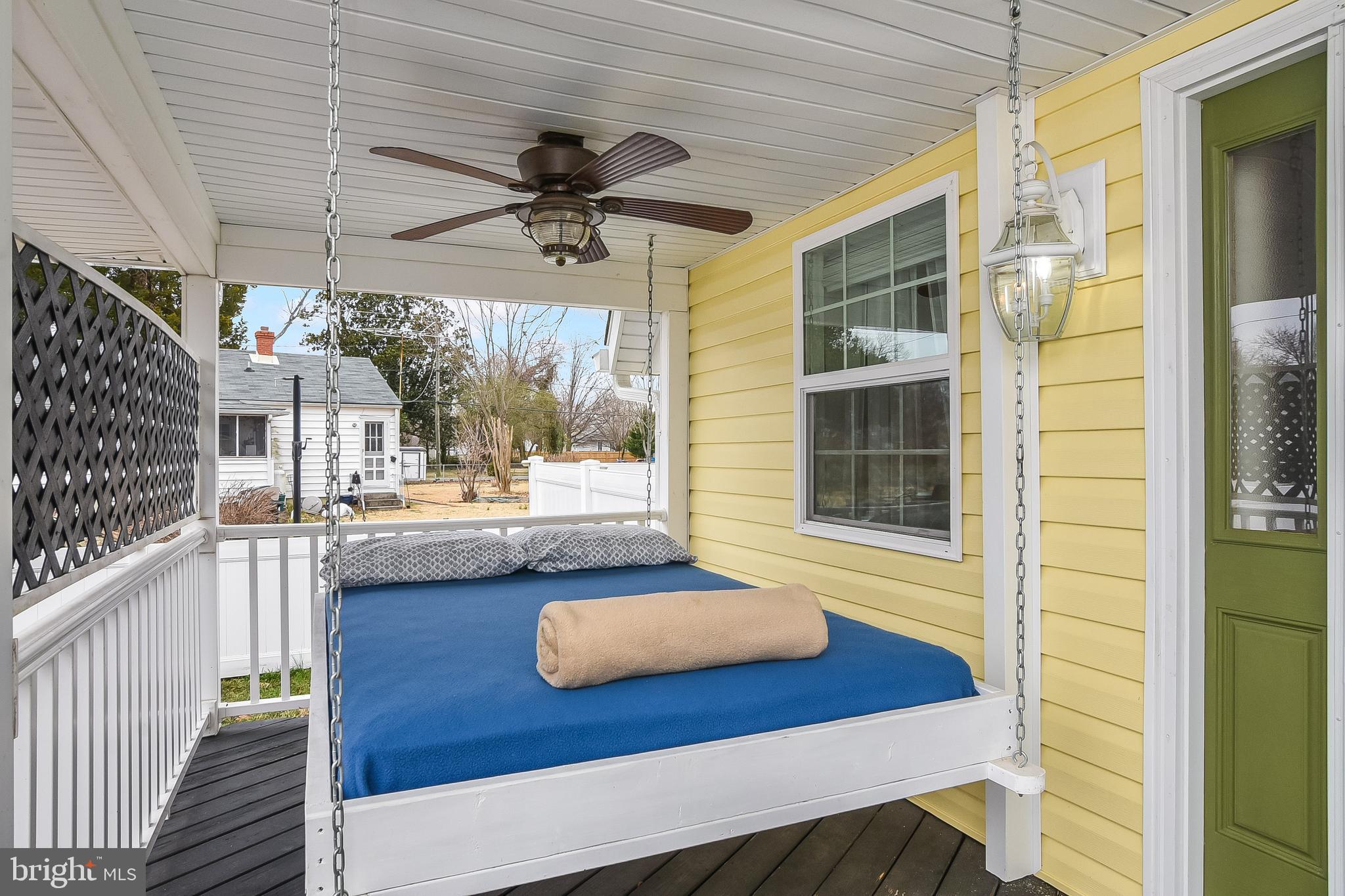 115 Nelson Street Colonial Beach, VA 22443 - Photo 2 of 45 Front Porch Napping