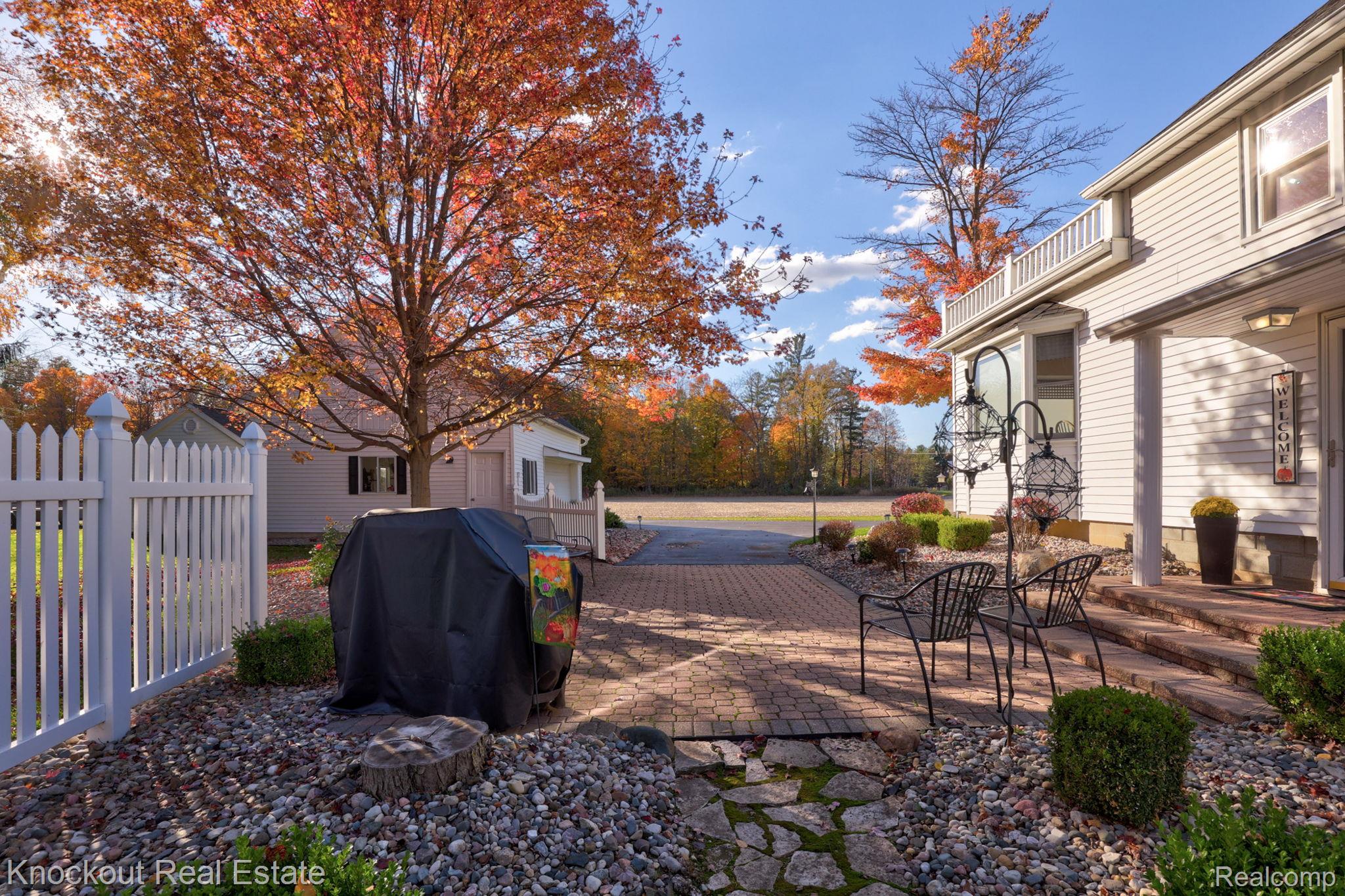 8980 Curtis Road Frankenmuth, MI 48734 - Photo 44 of 56 View of yard featuring a patio