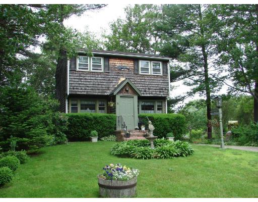5 Juniper Road Holbrook, MA 02343 - Photo 2 of 2 a front view of house with a garden