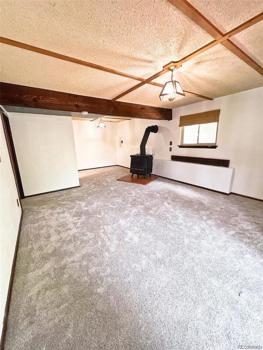 19424 Silver Ranch Road Conifer, CO 80433 - Photo 13 of 17 a view of a garage