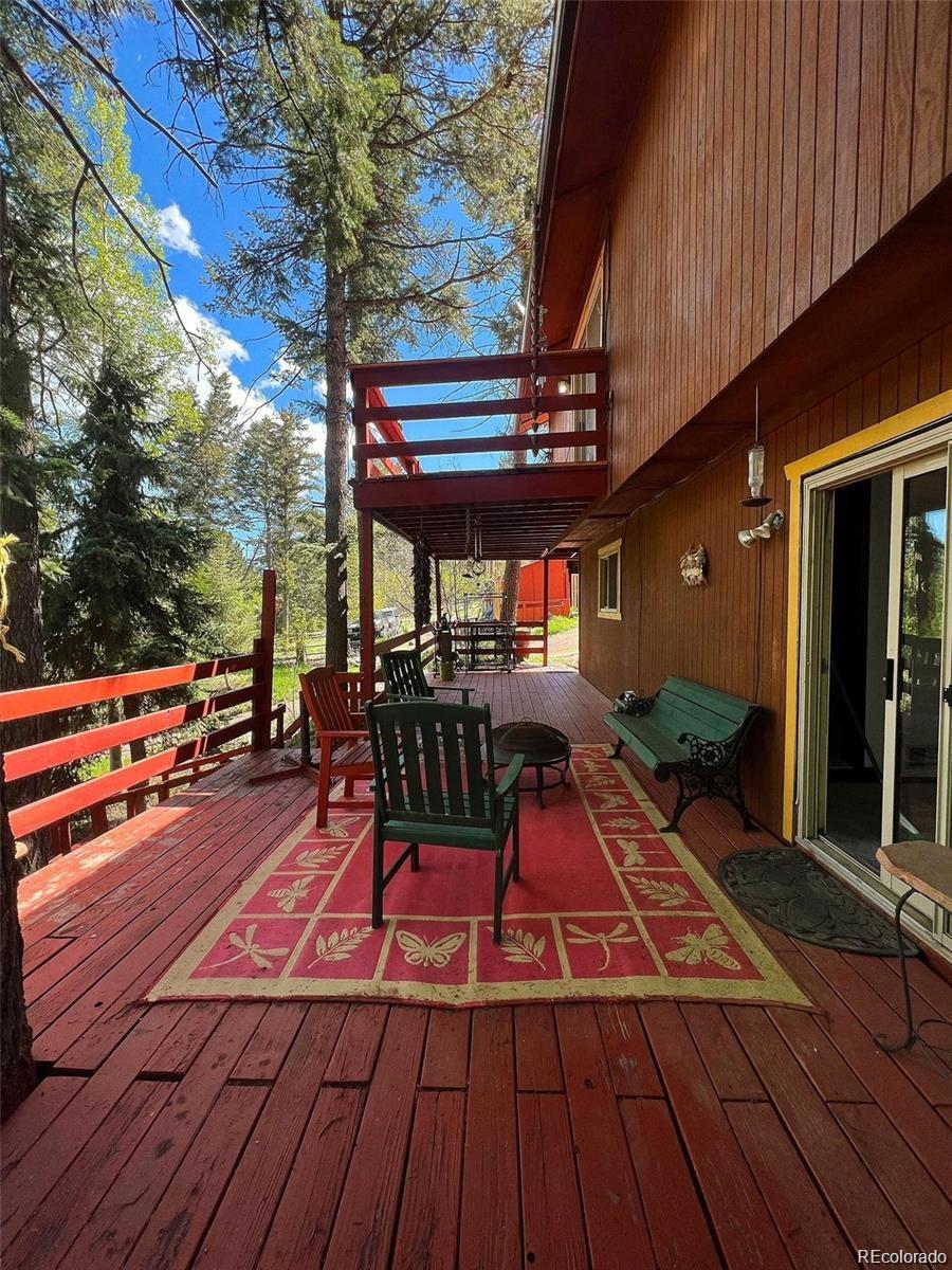 19424 Silver Ranch Road Conifer, CO 80433 - Photo 3 of 17 a outdoor view with a sitting space