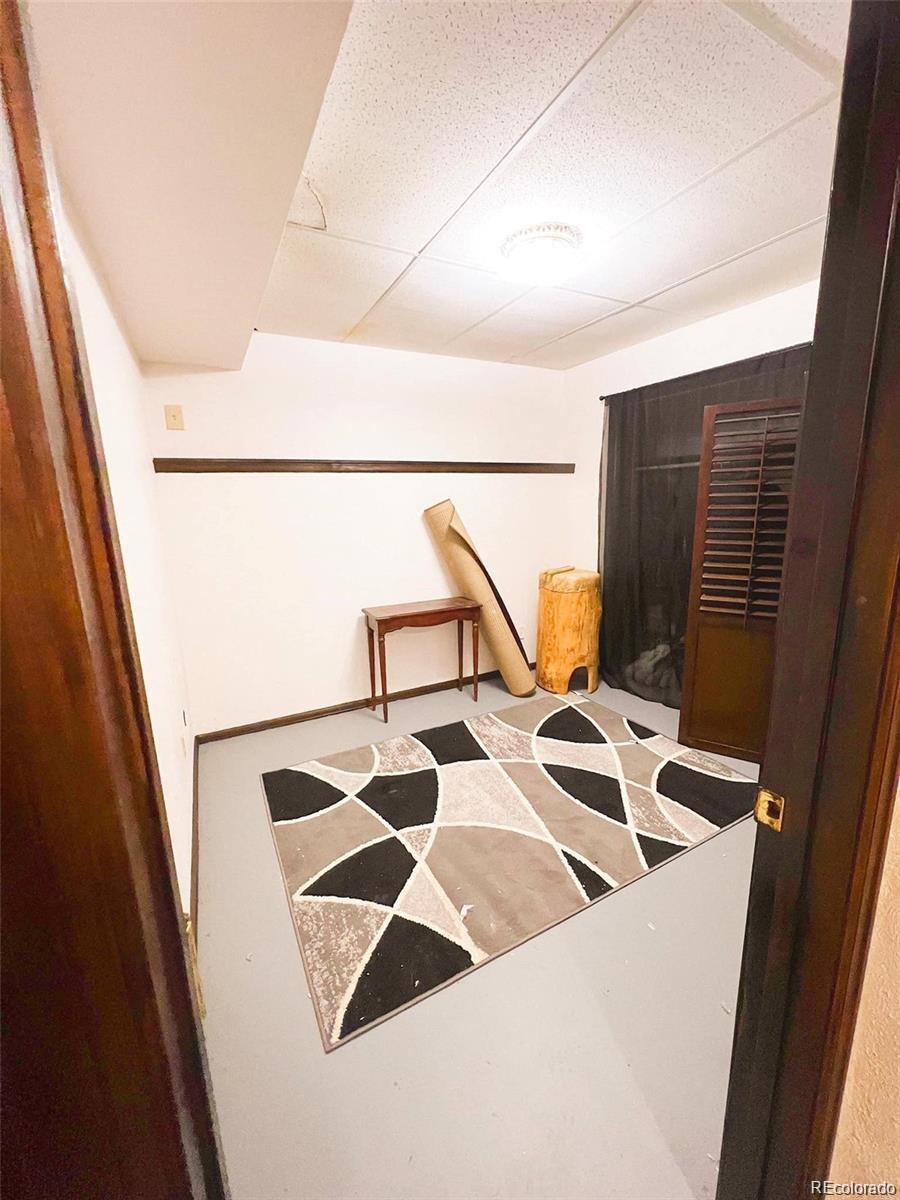 19424 Silver Ranch Road Conifer, CO 80433 - Photo 9 of 17 a close up of a storage and utility room with a sink