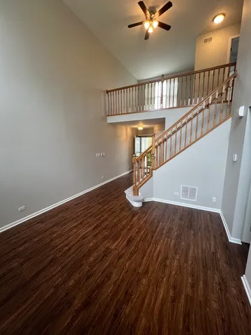 a view of entryway with wooden floor