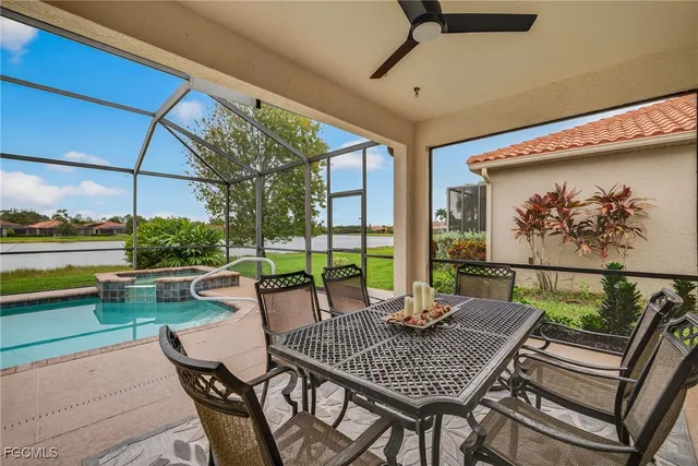 a view of a patio with a dining table and chairs