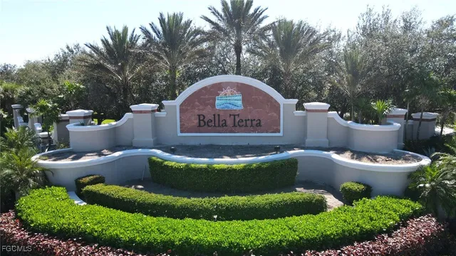 a view of a back yard with green space and plants