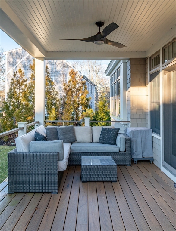 75 Streeter Hill Road Falmouth, MA 02556 - Photo 16 of 32 a balcony with furniture and wooden floor