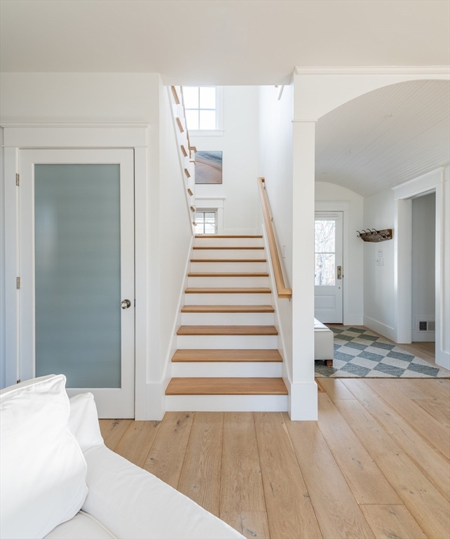 75 Streeter Hill Road Falmouth, MA 02556 - Photo 23 of 32 a view of a bedroom with wooden floor and stairs