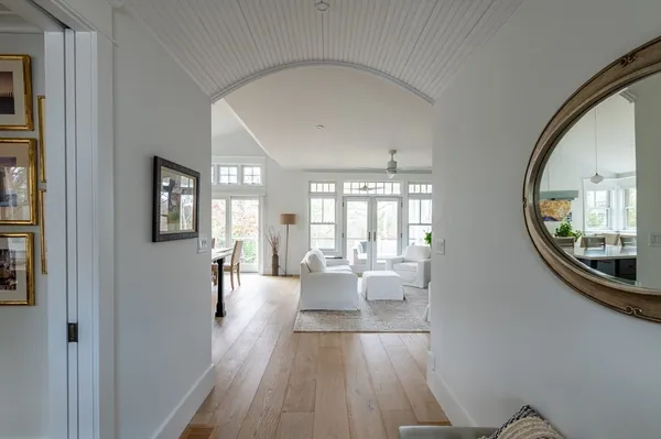 a view of a living room and dining room