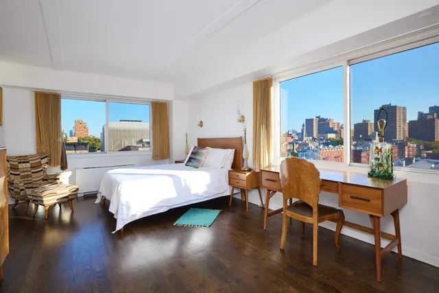 a kitchen with stainless steel appliances granite countertop a sink and a stove top oven