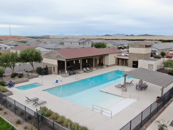 an aerial view of a house with swimming pool