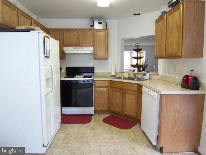 4511 Ingham Road Owings Mills, MD 21117 - Photo 4 of 13 Bright Kitchen with Pass-Thru