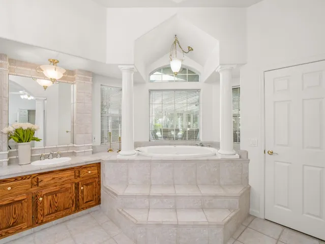 a kitchen with stainless steel appliances granite countertop a sink and cabinets