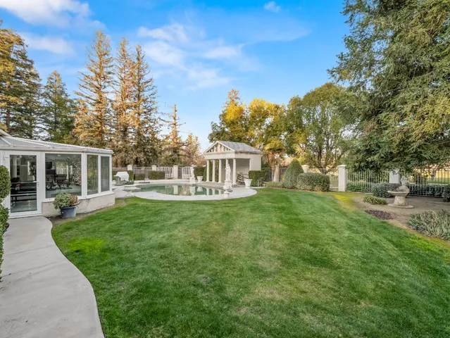 a view of a swimming pool with an ocean view