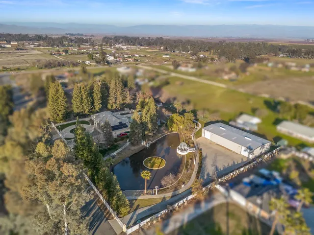 a view of a house with a swimming pool