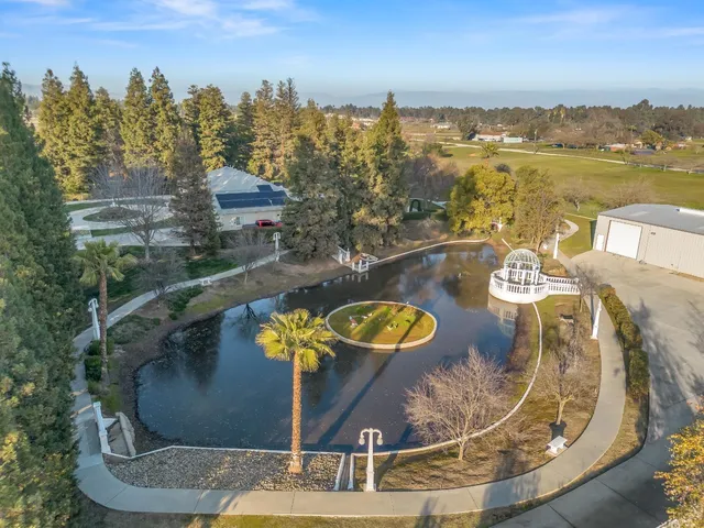 a view of a house with a yard porch and sitting area