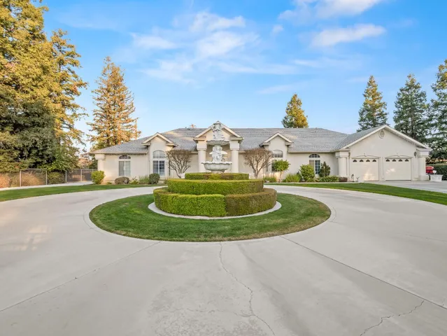 a view of house with outdoor space and street view